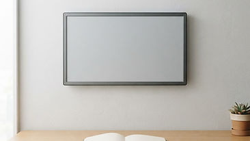 A blank web interface dashboard mounted on a light studio wall above a tidy desk.