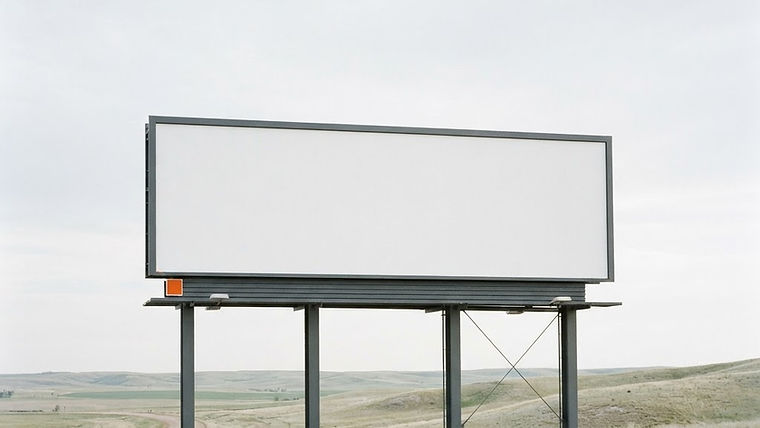 A clean, blank billboard standing against a clear sky in a minimalist composition.