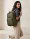 MATILEO Laptop Backpack — Olive (Olive), worn or held by model