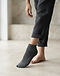 MATILEO Ankle Sock — Charcoal (Charcoal), worn or held by model