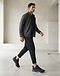 MATILEO Sport Lifestyle Shoe — Black (Black), worn or held by model