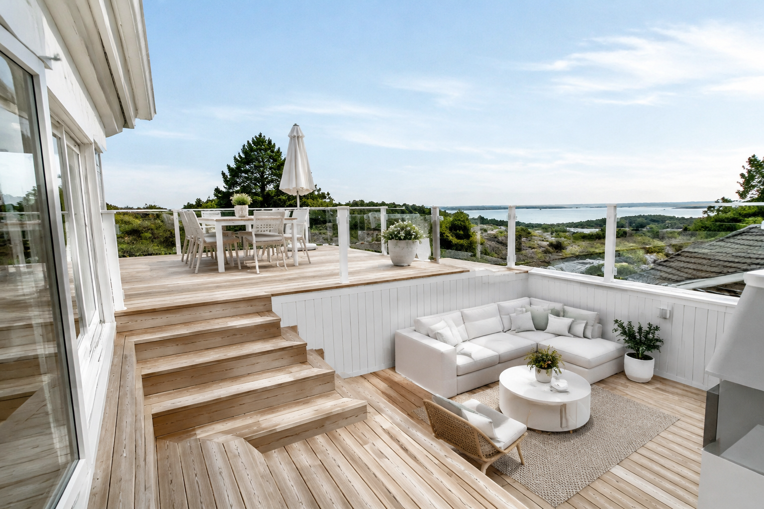 Scandinavian style two-level deck with light blonde wood and minimal white design