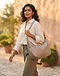 Stone Hobo Bag (Stone), worn or held by model