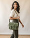 Sage Messenger Bag (Sage), worn or held by model