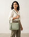 Sage Tassel Bag (Sage), worn or held by model