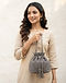 Grey Potli Bag (Grey), worn or held by model