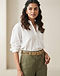 Tan Chain Belt (Tan), worn or held by model