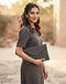 Charcoal Envelope Clutch (Charcoal), worn or held by model