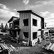 Exterior inspection of a modern building facade during routine property maintenance