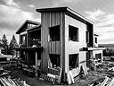 Exterior inspection of a modern building facade during routine property maintenance