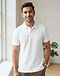 Men's Pique Knit Cotton Blend Polo — White (White), worn or held by model