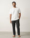 Unisex Basic Fleece Crew Tee — White (White), worn or held by model