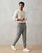 Unisex Wool Blend Track Pants — Grey (Grey), worn or held by model