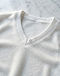 Unisex Fleece V-Neck Tee — White (White), detail close-up