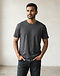 Men's Relaxed Fit Combed Cotton Crew Tee — Charcoal (Charcoal), worn or held by model