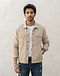 Unisex Cotton Blend Denim Jacket — Beige (Beige), worn or held by model