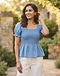 Women's Smocked Bodice Top — Blue (Blue), worn or held by model