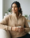 Unisex Quarter Zip Cotton Blend Pullover — Beige (Beige), worn or held by model