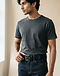 Unisex Cotton Blend Reversible Belt — Black (Black), worn or held by model