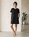 Women's Casual T-Shirt Dress — Black (Black), worn or held by model
