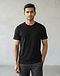 Men's Plain Essential Combed Cotton Tee — Black (Black), worn or held by model