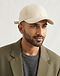 Unisex Wool Blend Polo Cap — Cream (Cream), worn or held by model