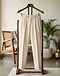 Men's French Terry Pleated Trousers — Cream (Cream), lifestyle setting