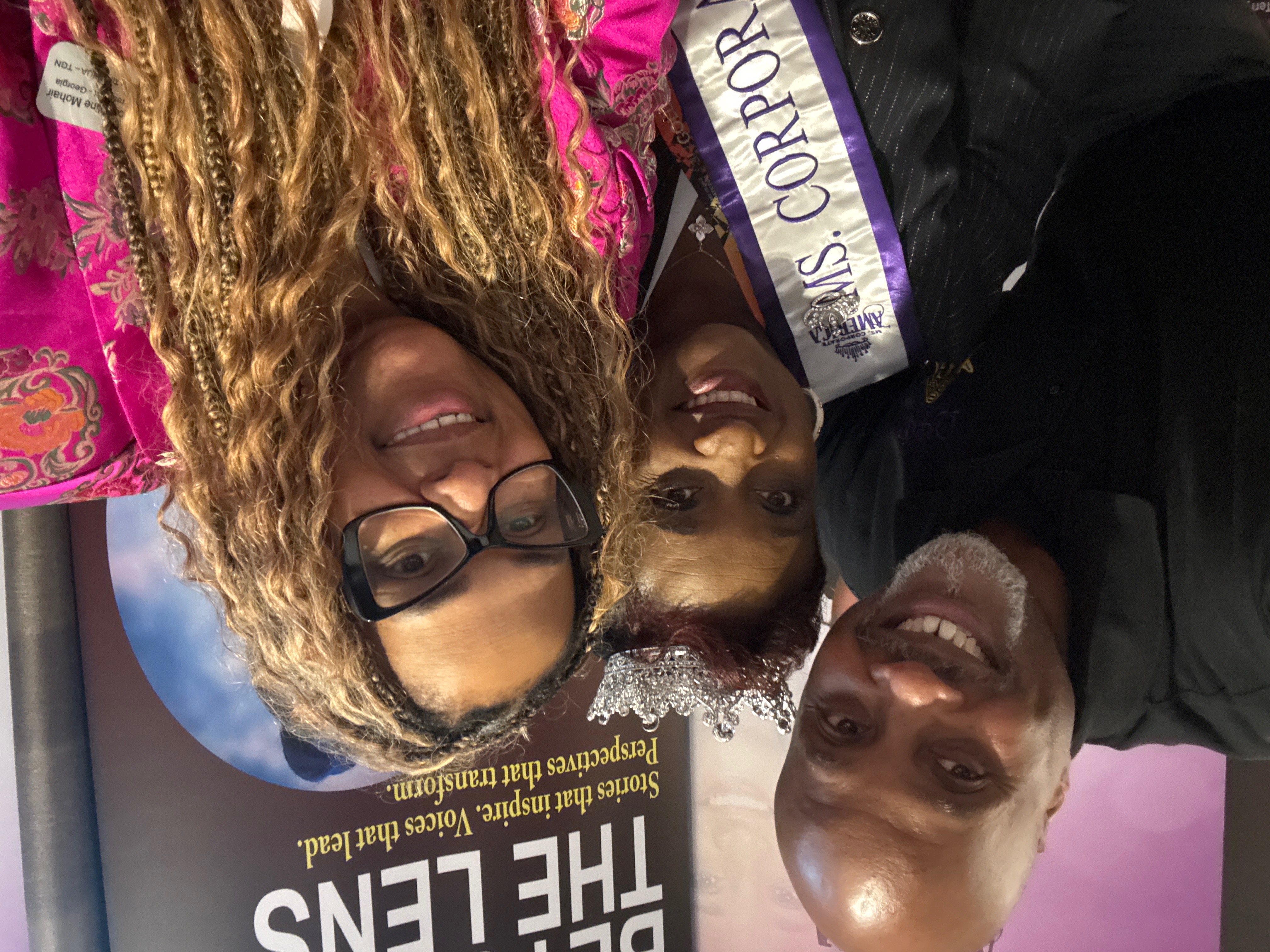 Three friends together at the Beyond the Lens celebration