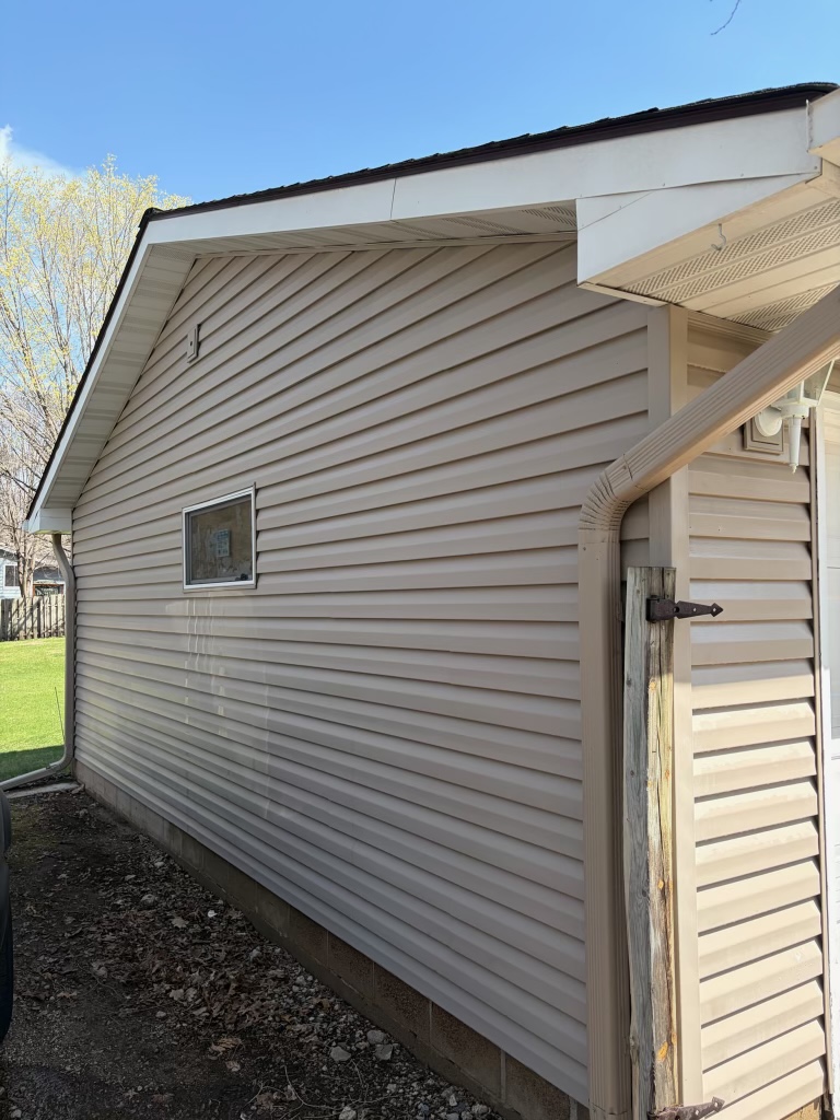 Garage siding wash — after