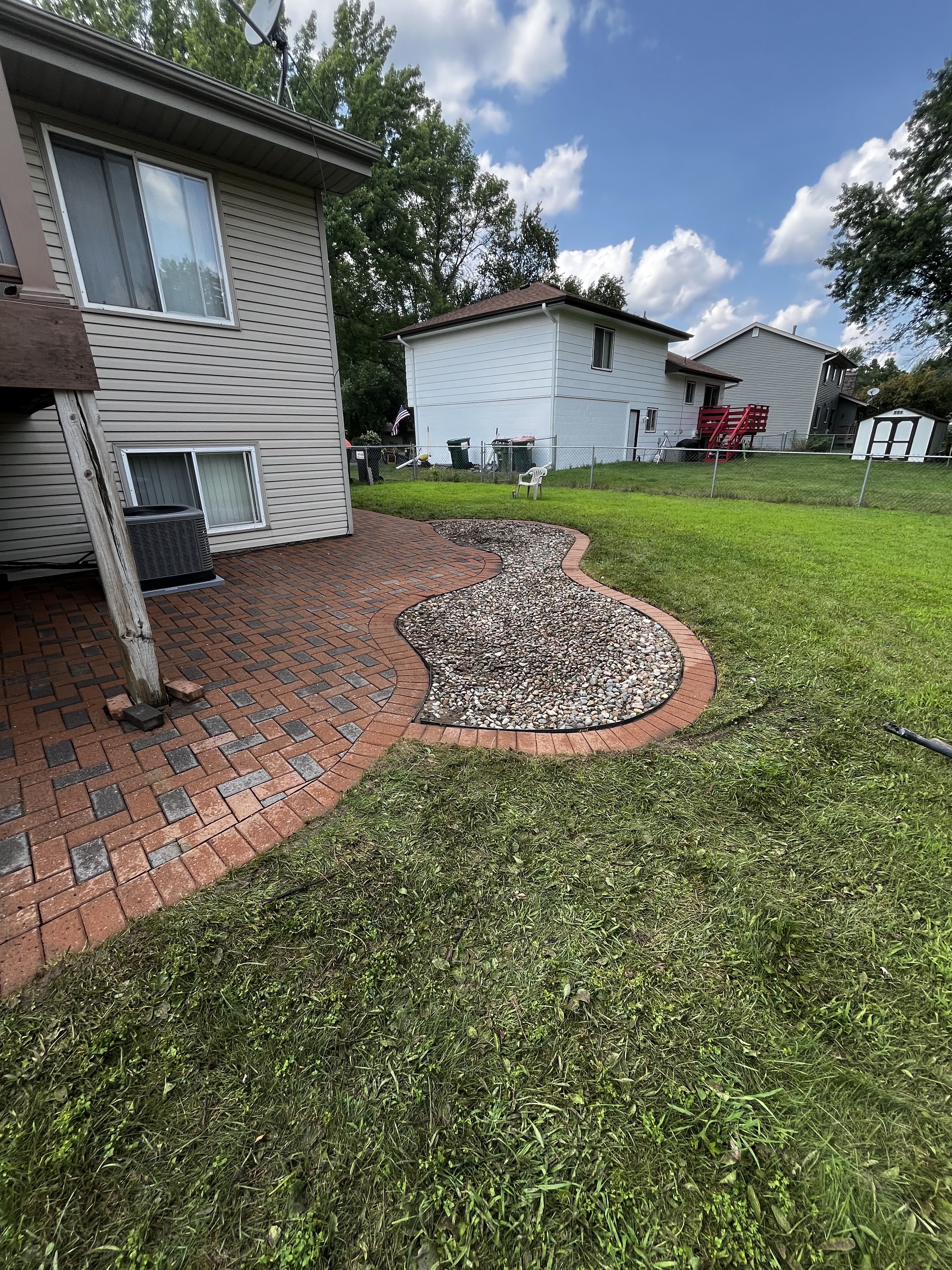 Paver patio & landscape bed — after