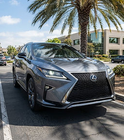 Gray Lexus RX with crystal clear restored headlights