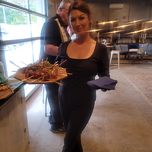 Liberty serving hors d'oeuvres at an event