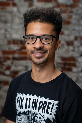 Portrait of a man in a Fix It In Pre t-shirt, photographed in Northern Illinois