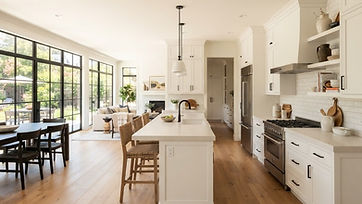 Bright remodeled home interior with new cabinets, flooring and lighting