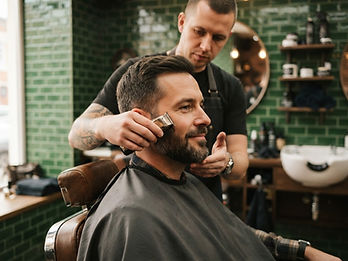 Illustration d'une taille de barbe au peigne et à la tondeuse.
