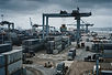 Stacked shipping containers and freight vehicles in a logistics yard