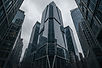 Glass and stone office towers in a financial district