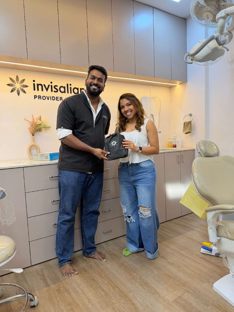 Align And Shine Dental Clinic patient with Invisalign provider branding