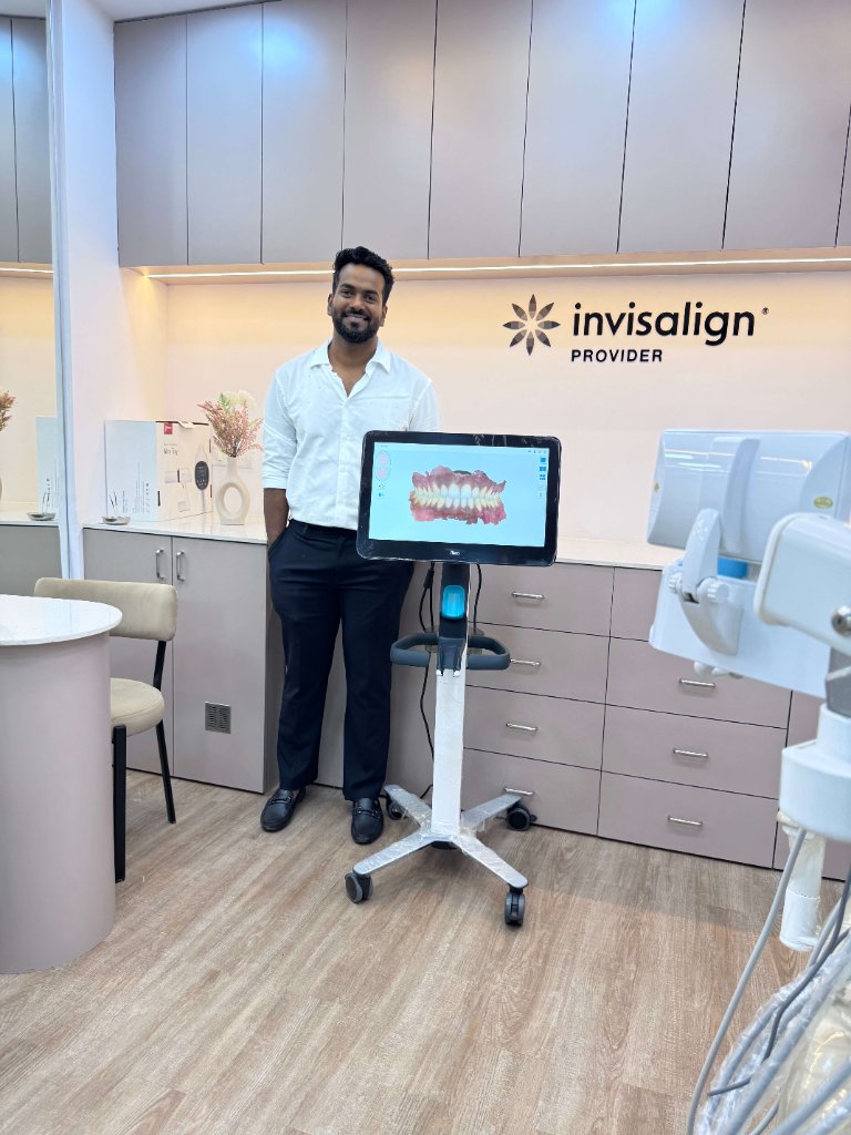 Dr. Akram with intraoral scanner at Align And Shine Dental Clinic