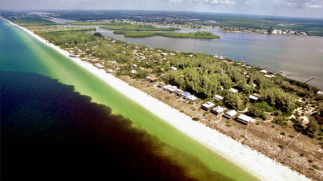 Aerial view of a Florida barrier island coastline showing the contrast between ocean and inland waterway