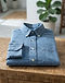 Solid Chambray Shirt - Blue (Blue), worn or held by model
