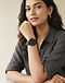 Minimalist Analog Watch - Black (Black), worn or held by model