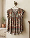 Boho Printed Blouse (Multi-Color), worn or held by model