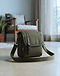 Crossbody Messenger Bag - Olive (Olive), worn or held by model