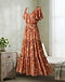 Boho Floral Maxi (Terracotta), worn or held by model
