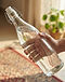 Eagle Rotlo Giara Glass Water Bottle - 1 Litre (Clear), lifestyle setting