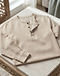 Linen Blend Henley Top (Beige), worn or held by model