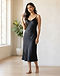 Satin Slip Midi (Midnight Black), worn or held by model