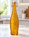 Amber textured glass swing-top bottle on a marble kitchen counter