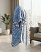 Flutter Sleeve Blouse (Floral Blue), worn or held by model